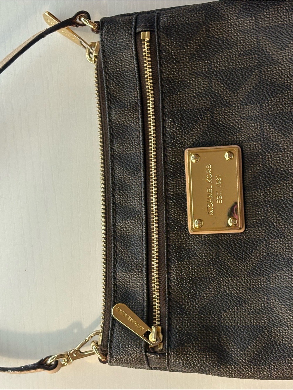 Michael Kors Brown Monogram Pebbled Leather Wristlet with Gold Hardware